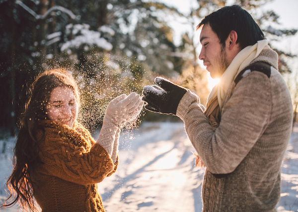 couple, play, snow, winter, love, laughing - MeetMindful | A Fuller Life Together